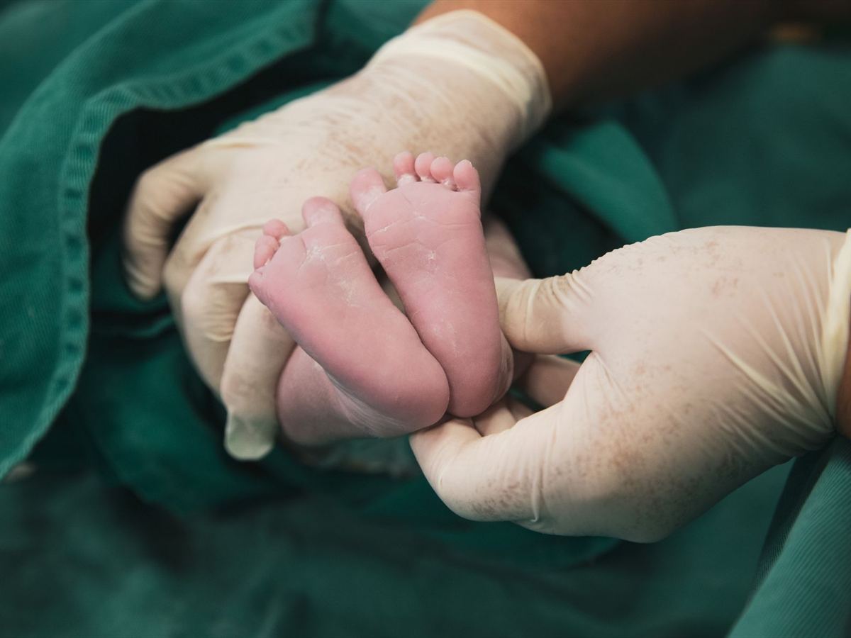 A baby being weighed at the clinic