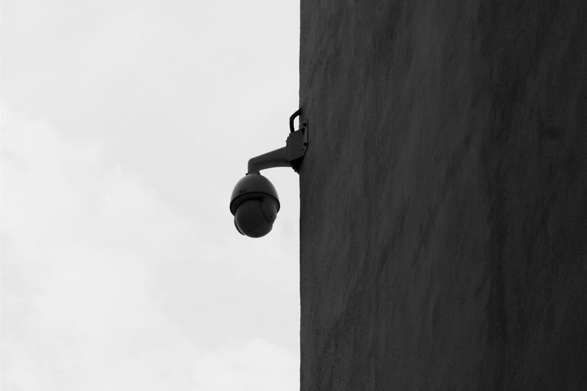 Compact camera mounted on an exterior wall