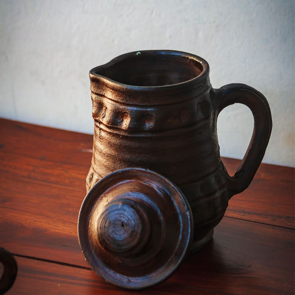 Hand-thrown glazed ceramic jug