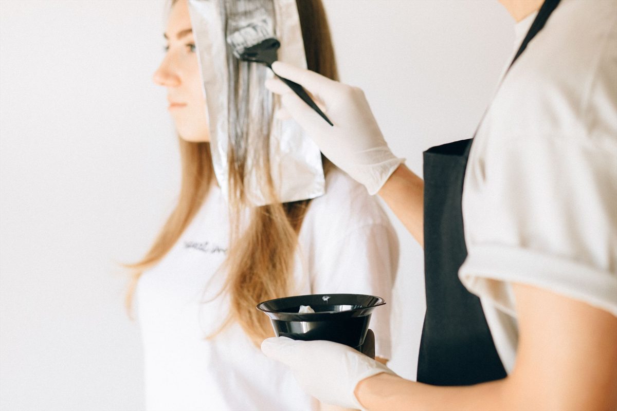 Foils being applied section by section during a colour service
